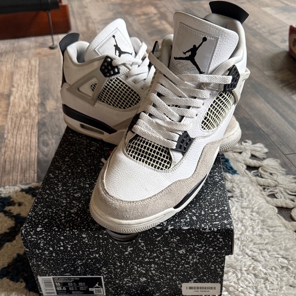 Air Jordan 4 Retro White and Black Sneakers